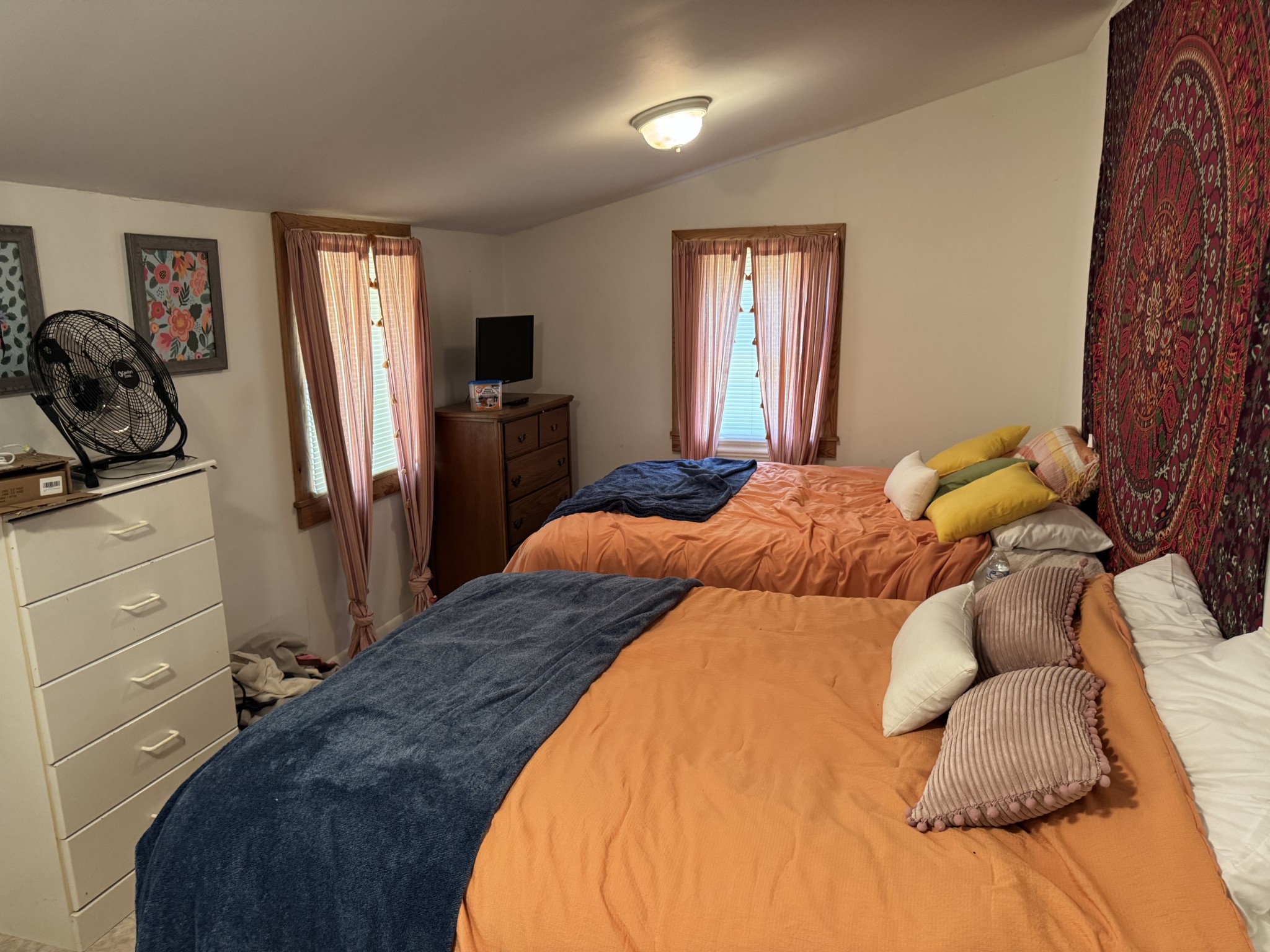 100 Haylee Road Waverly, TN 37185 - Photo 7 of 13 a bedroom with a bed and a refrigerator