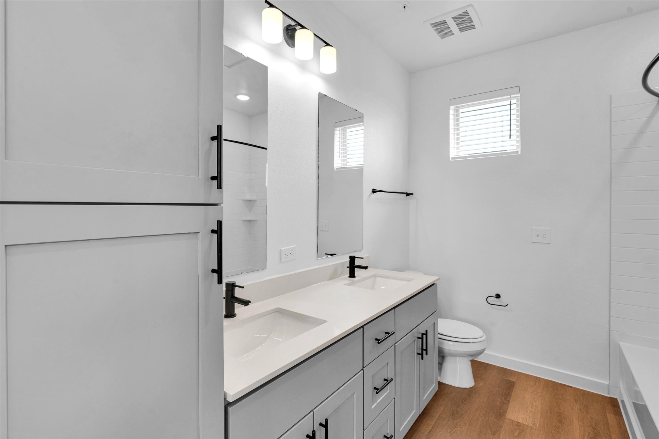 1521-222 Bernard Street Rowlett, TX 75089 - Photo 13 of 38 a bathroom with a sink toilet and shower