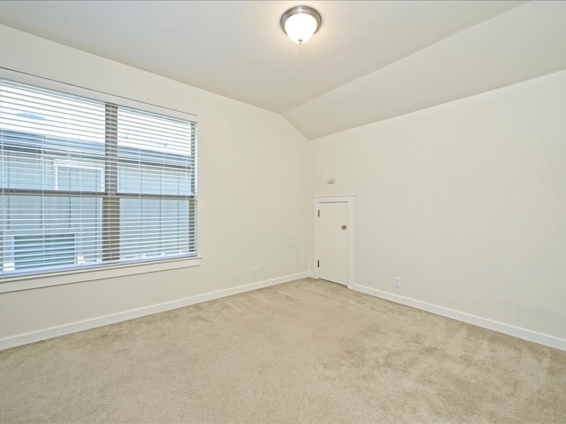2101 Rivers Edge Way, Unit 29 Austin, TX 78741 - Photo 27 of 38 2nd level bedroom