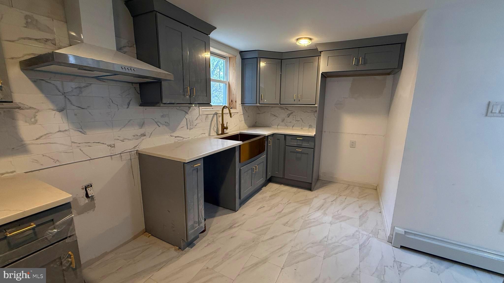 210 Cherry Street Duryea, PA 18642 - Photo 12 of 26 a kitchen with stainless steel appliances granite countertop a sink stove and refrigerator