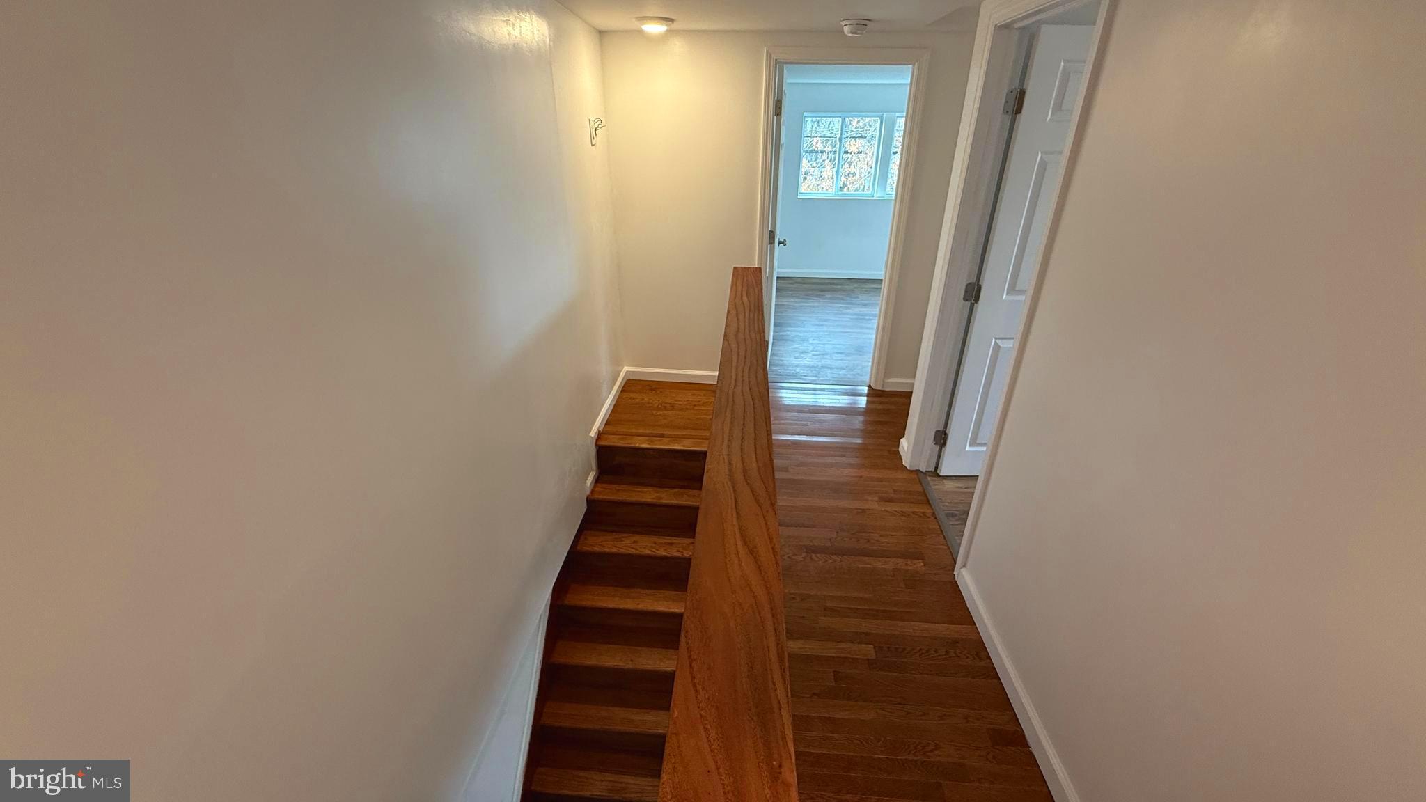 210 Cherry Street Duryea, PA 18642 - Photo 20 of 26 a view of a hallway with wooden floor and entryway