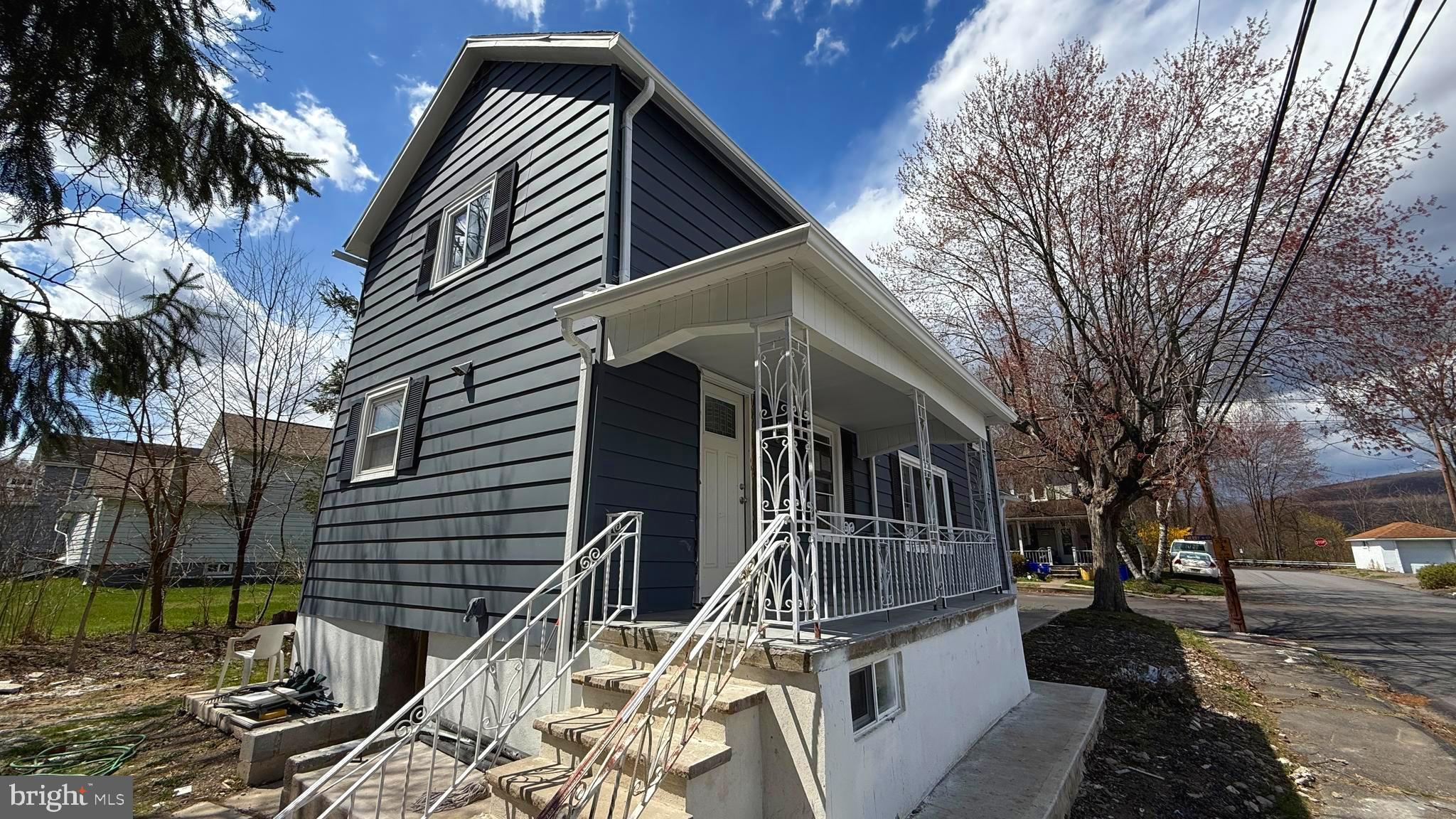 210 Cherry Street Duryea, PA 18642 - Photo 6 of 26 a view of a house with a yard