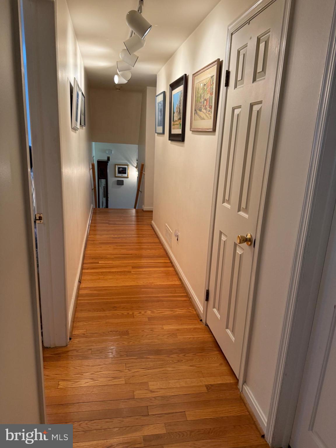 1179 Beaumont Road Berwyn, PA 19312 - Photo 26 of 64 a view of a hallway with wooden floor