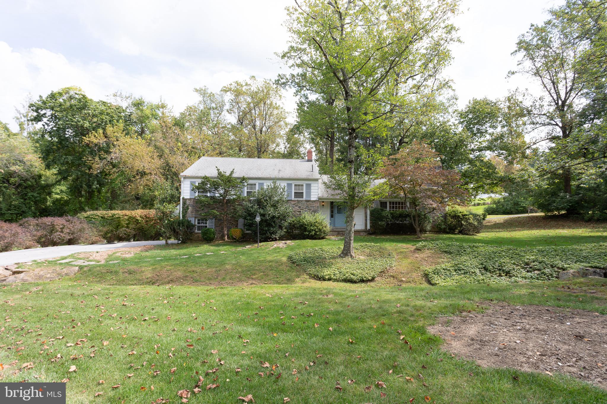 1179 Beaumont Road Berwyn, PA 19312 - Photo 35 of 64 a view of a big yard with plants and large trees