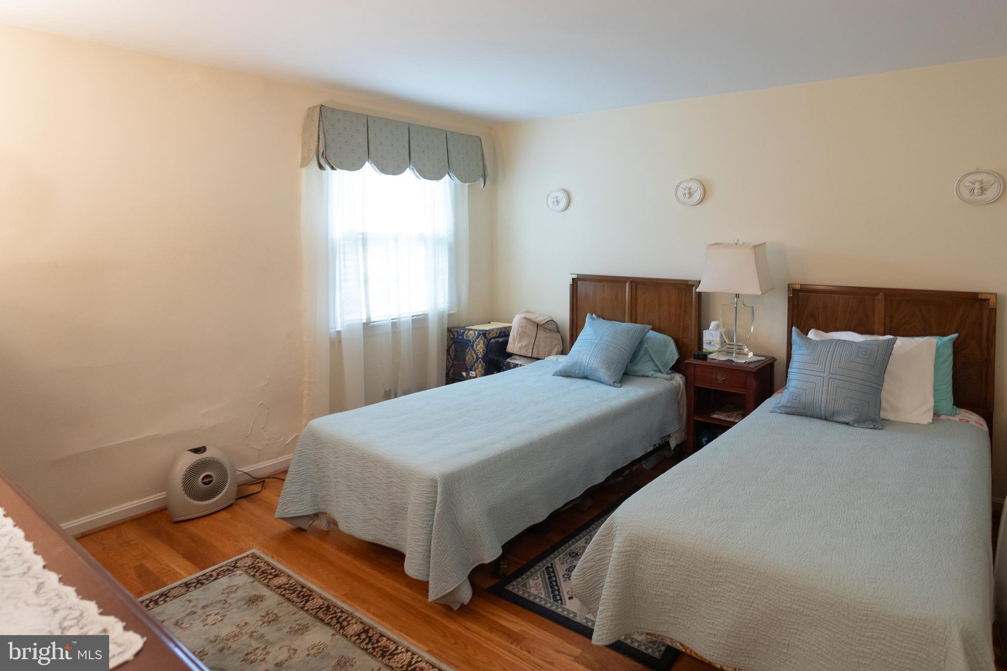 1179 Beaumont Road Berwyn, PA 19312 - Photo 60 of 64 a bedroom with two beds and window