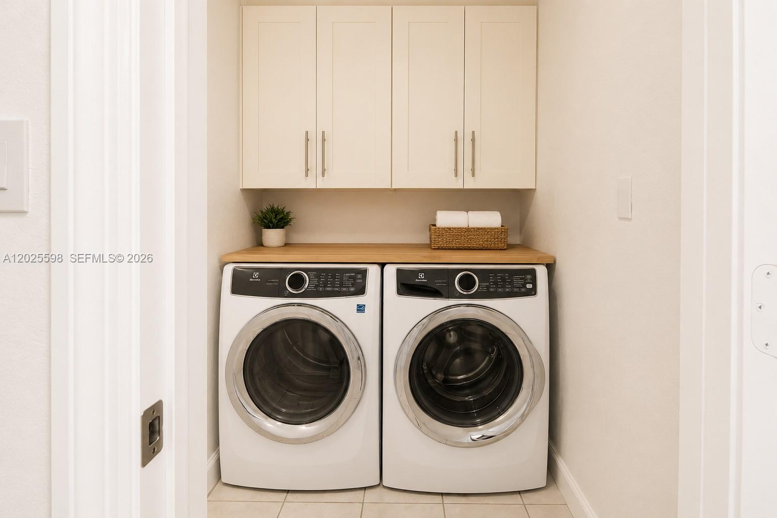 9421 Southwest 150th Street Miami, FL 33176 - Photo 23 of 31 a utility room with dryer and washer