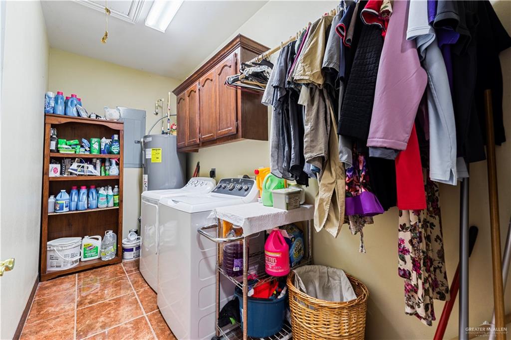 10675 Texan Road Mission, TX 78574 - Photo 13 of 23 a utility room with lot of items