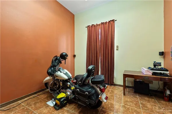 a room with furniture and a window