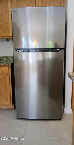 a bathroom with a shower and a toilet