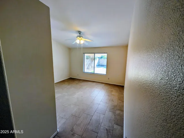 a bathroom with a glass door shower