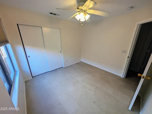 a bathroom with a double vanity sink and mirror