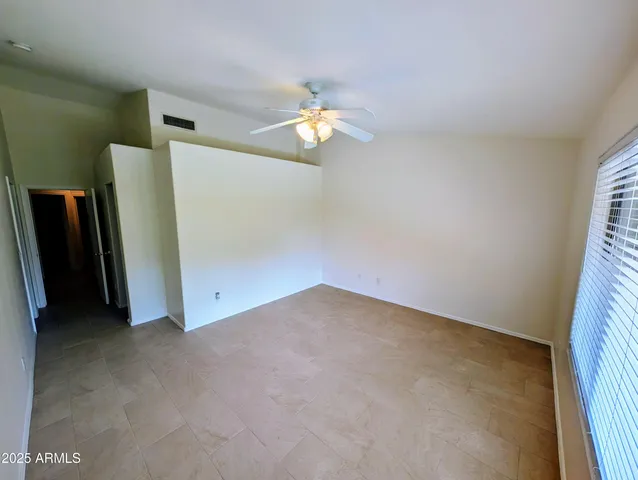 a view of a swimming pool with a yard