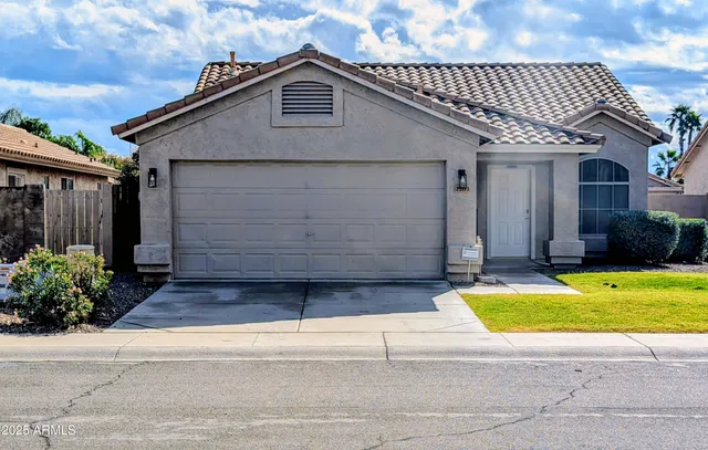 a view of a backyard with potted plants
