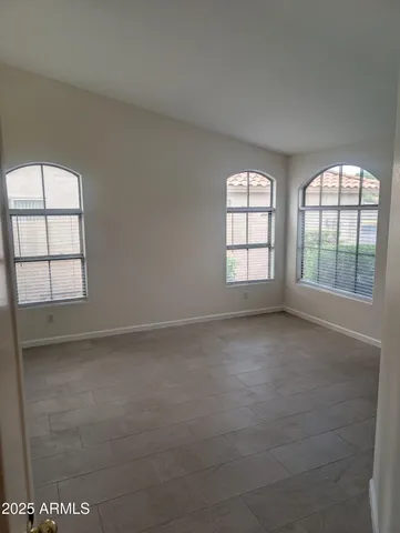 a kitchen with granite countertop a stove and a sink