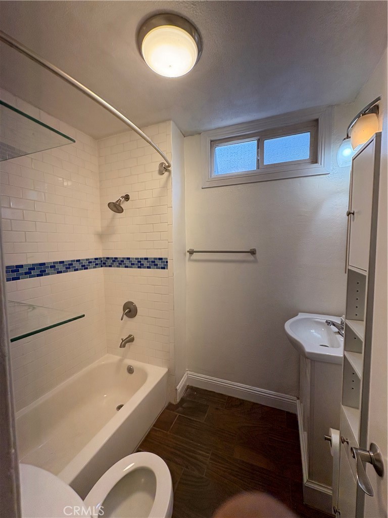1325 1/2 Douglas Street Los Angeles, CA 90026 - Photo 20 of 23 a bathroom with a sink a toilet and shower