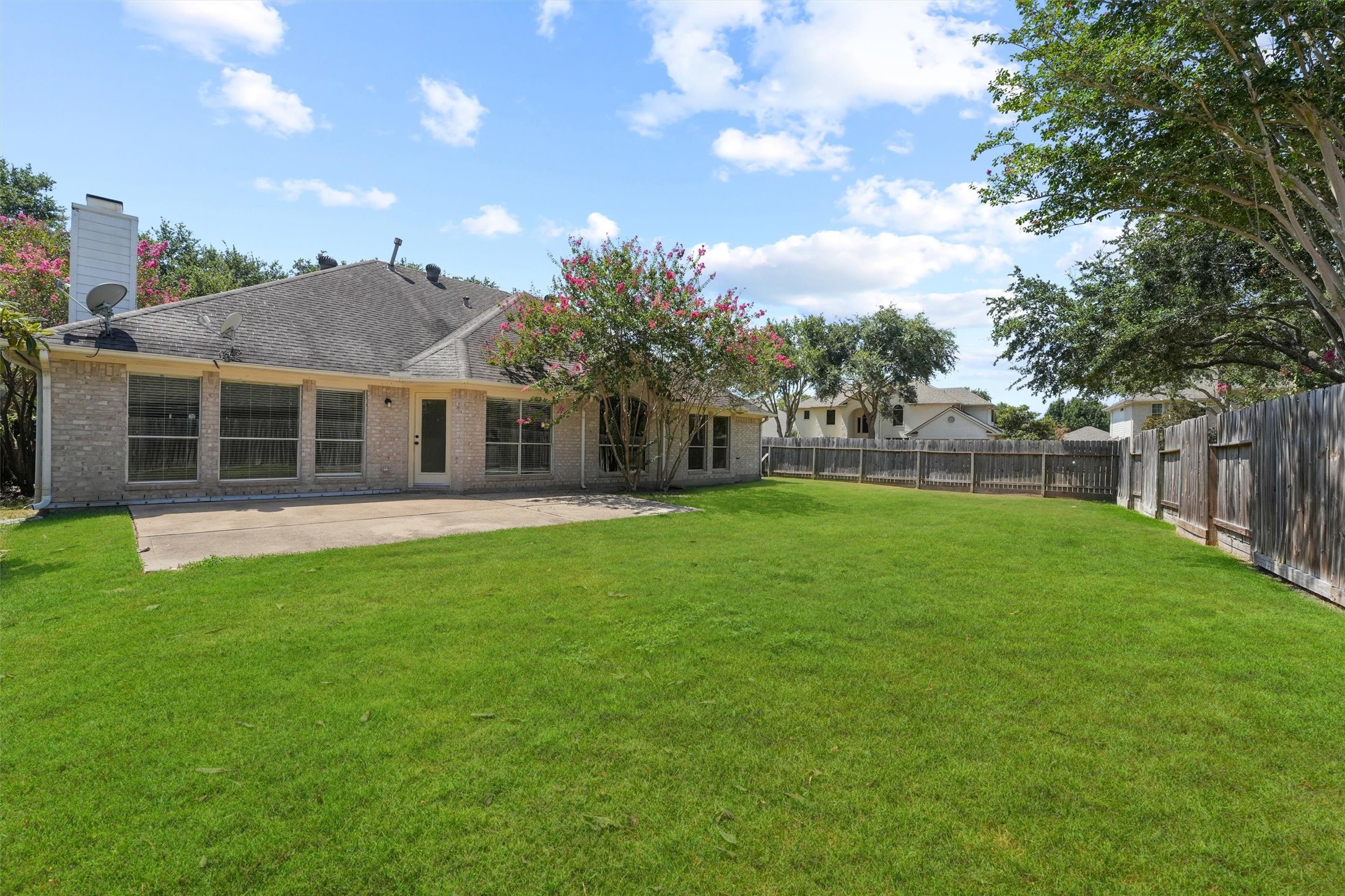 6803 Rhodes Court Missouri City, TX 77459 - Photo 13 of 13 a view of a house with a backyard