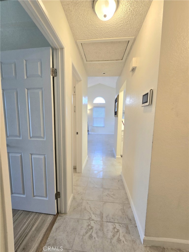 36839 Goldenview Way Palmdale, CA 93552 - Photo 14 of 20 a view of a hallway