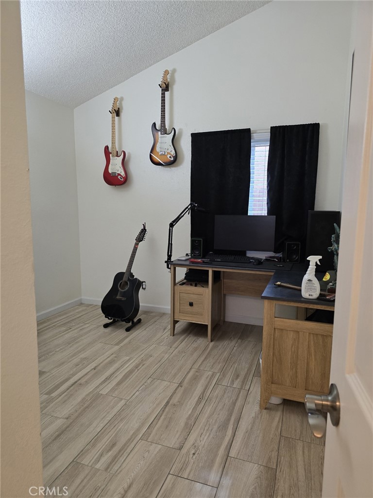 36839 Goldenview Way Palmdale, CA 93552 - Photo 19 of 20 a view of workspace and wooden floor