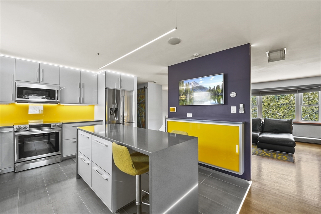 182 Needham Street Dedham, MA 02026 - Photo 7 of 33 a swimming pool with seating area and tub