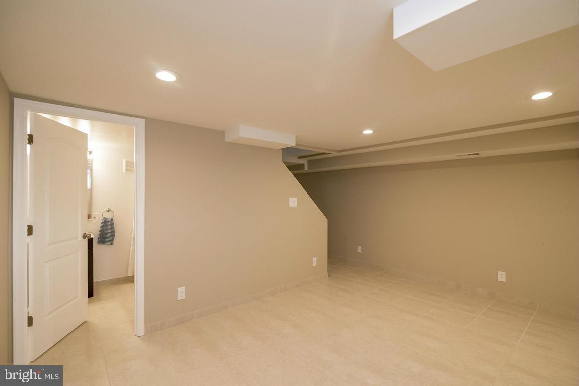 718 Middlesex Road Baltimore, MD 21221 - Photo 23 of 30 a view of an empty room