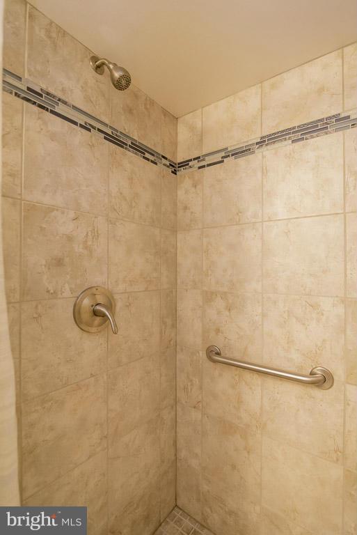 718 Middlesex Road Baltimore, MD 21221 - Photo 27 of 30 a bathroom with a shower