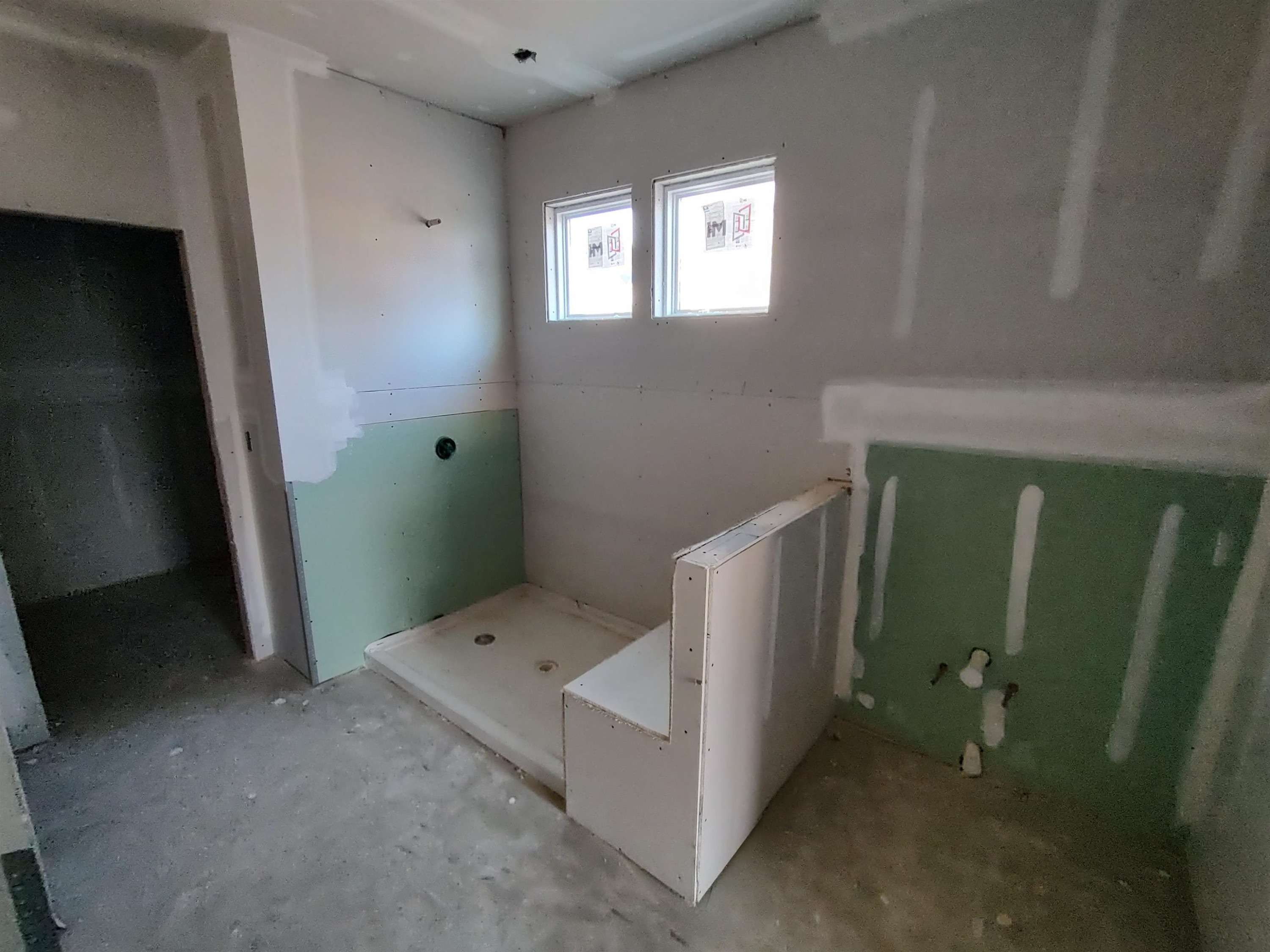18 Cliffview Drive Garner, NC 27529 - Photo 15 of 26 a bathroom with a toilet sink and shower