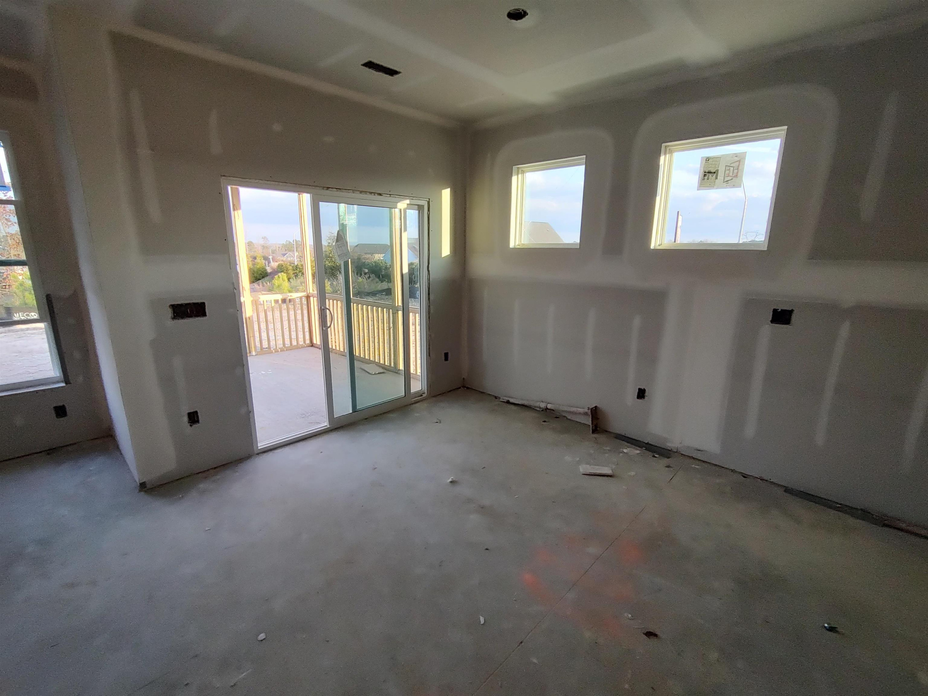 18 Cliffview Drive Garner, NC 27529 - Photo 10 of 26 an empty room with windows