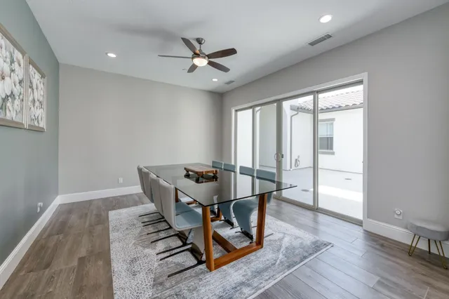 a living room with a bed furniture and a window