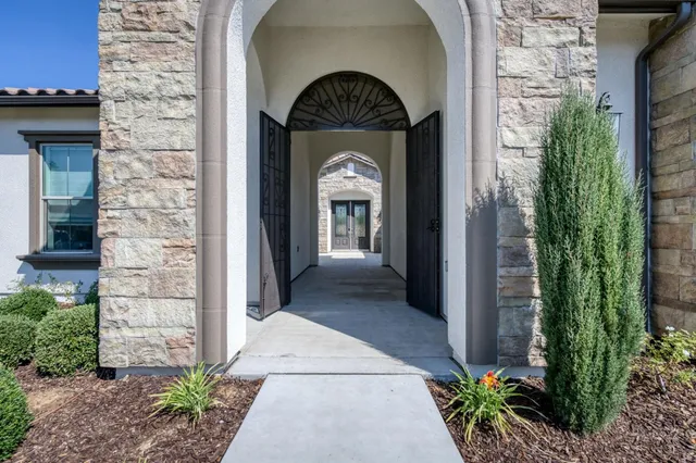 a view of a wooden door of the house