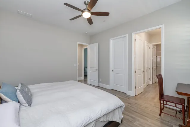 a view of a house with a snow on the road