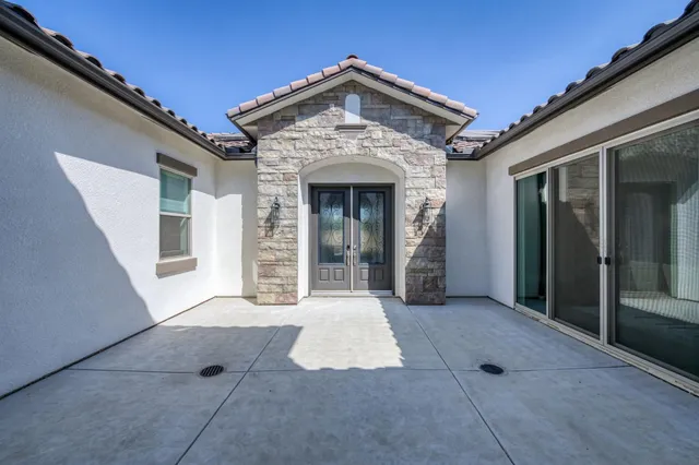 a view of an entryway door with wooden floor