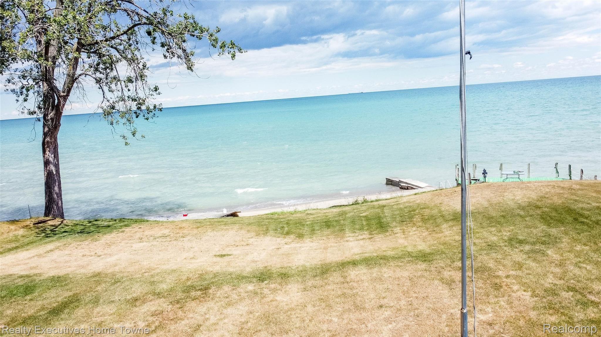 8281 Lakeshore Road Lexington, MI 48450 - Photo 5 of 29 No stairs here! Walk out to your sandy beach on Lake Huron!