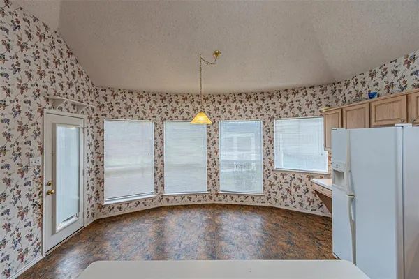 a view of a livingroom with wooden floor