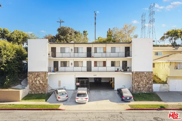 a front view of a house with swimming pool