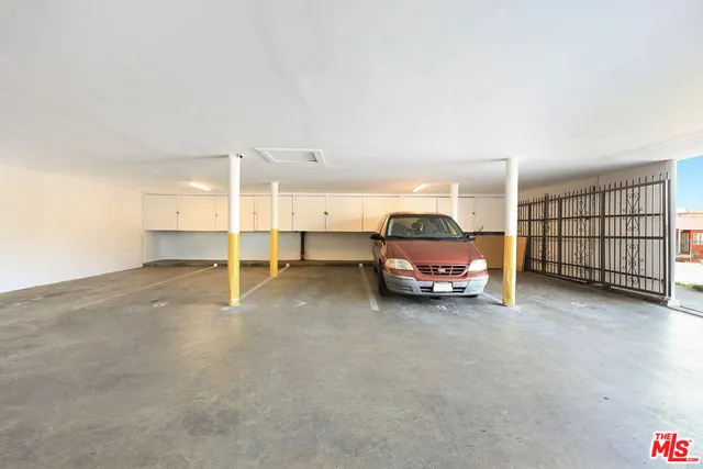 a view of a livingroom with furniture and a cabinet