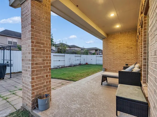 a view of yard with outdoor seating