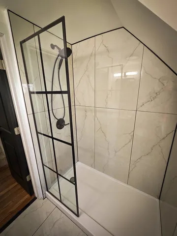 a view of bedroom with window