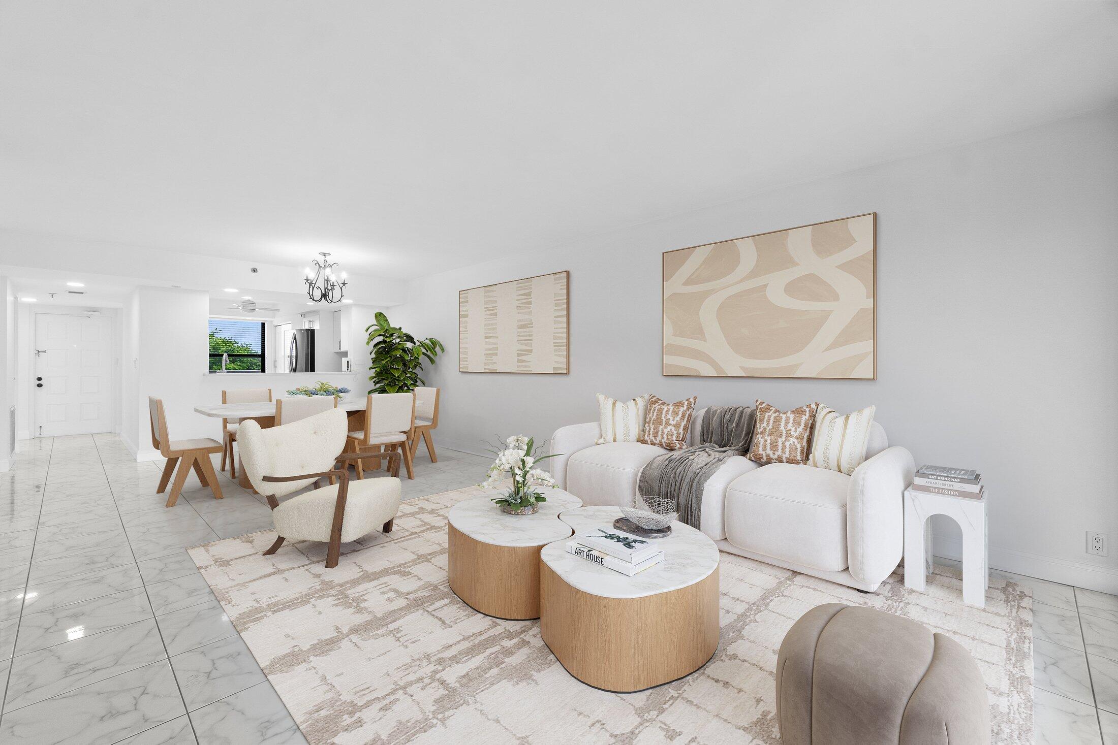 6562 Boca Del Mar Drive, Unit 527 Boca Raton, FL 33433 - Photo 3 of 38 a living room with furniture and a painting on the wall