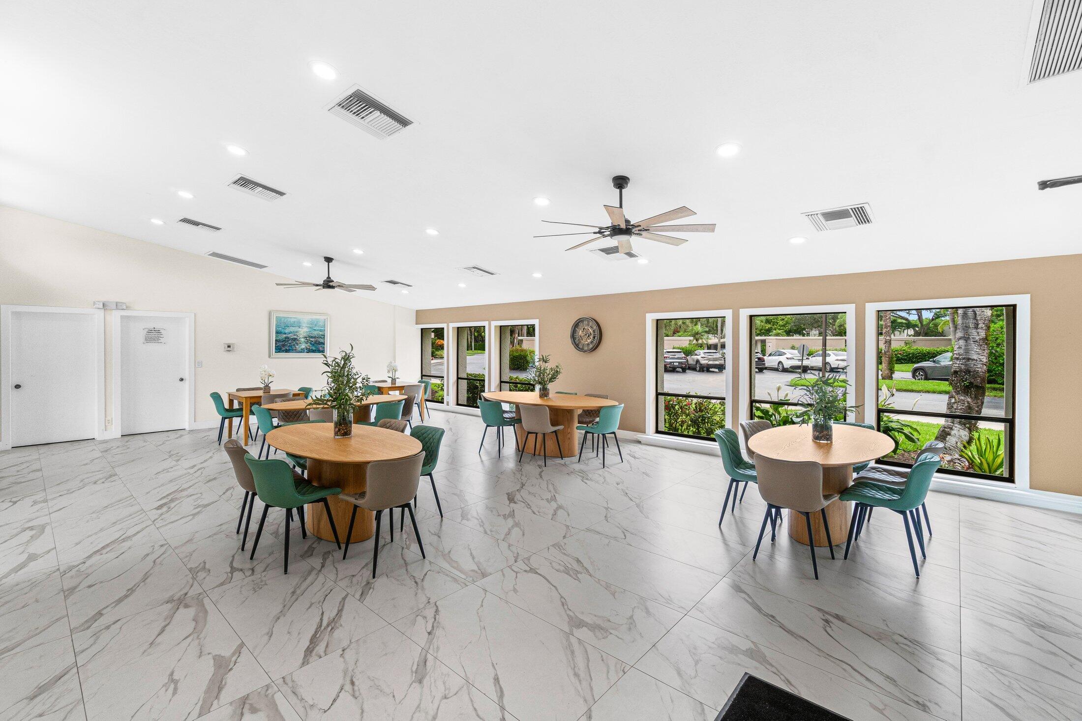 6562 Boca Del Mar Drive, Unit 527 Boca Raton, FL 33433 - Photo 33 of 38 a view of a dining room with furniture window and outside view