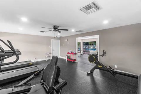 a view of a room with gym equipment