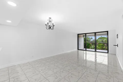 en empty room with windows