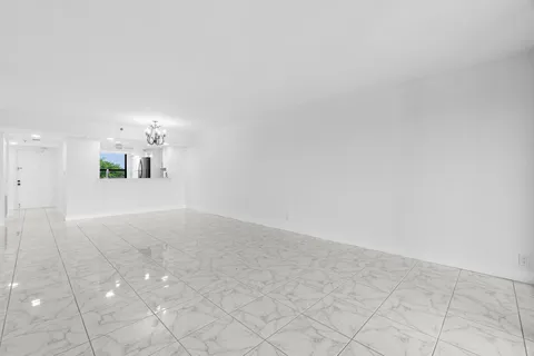 a view of a kitchen with a sink