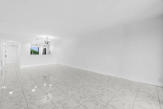 a view of a kitchen with a sink