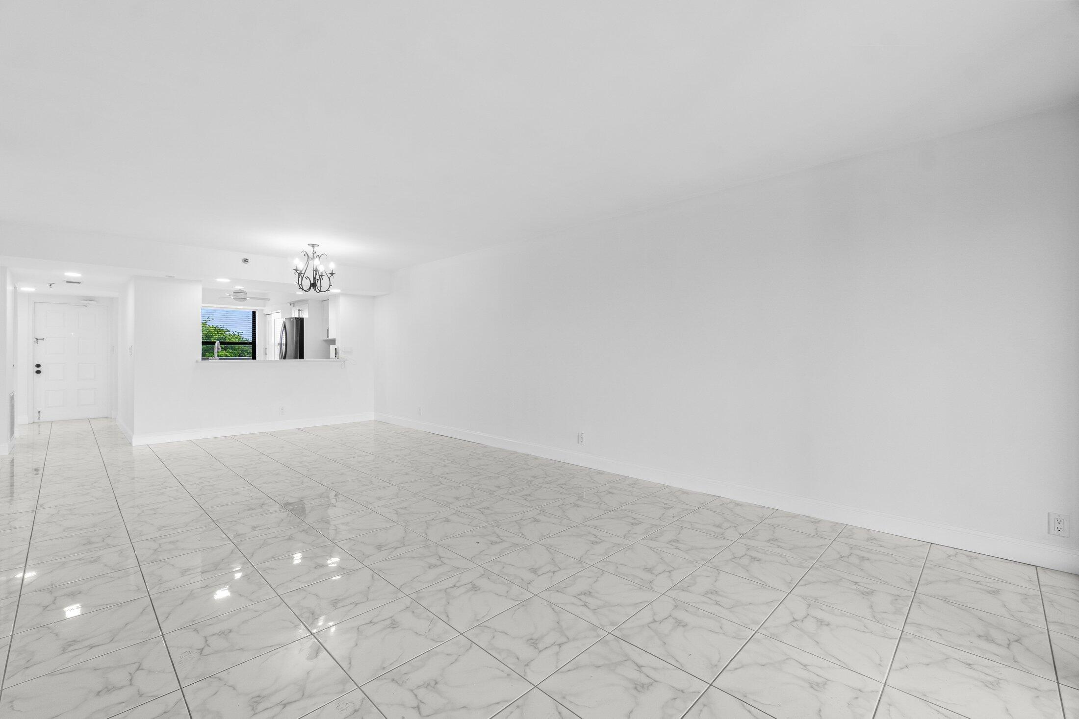 6562 Boca Del Mar Drive, Unit 527 Boca Raton, FL 33433 - Photo 9 of 38 a view of a kitchen with a sink