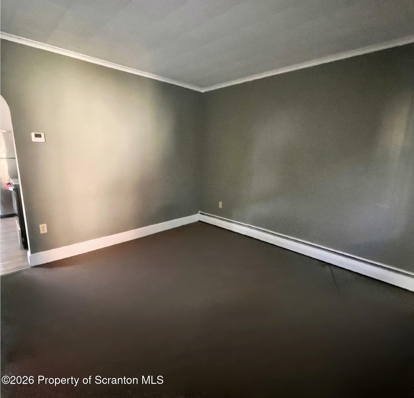 707 Prospect Avenue, Unit REAR Scranton, PA 18505 - Photo 2 of 11 an empty room with a workbench