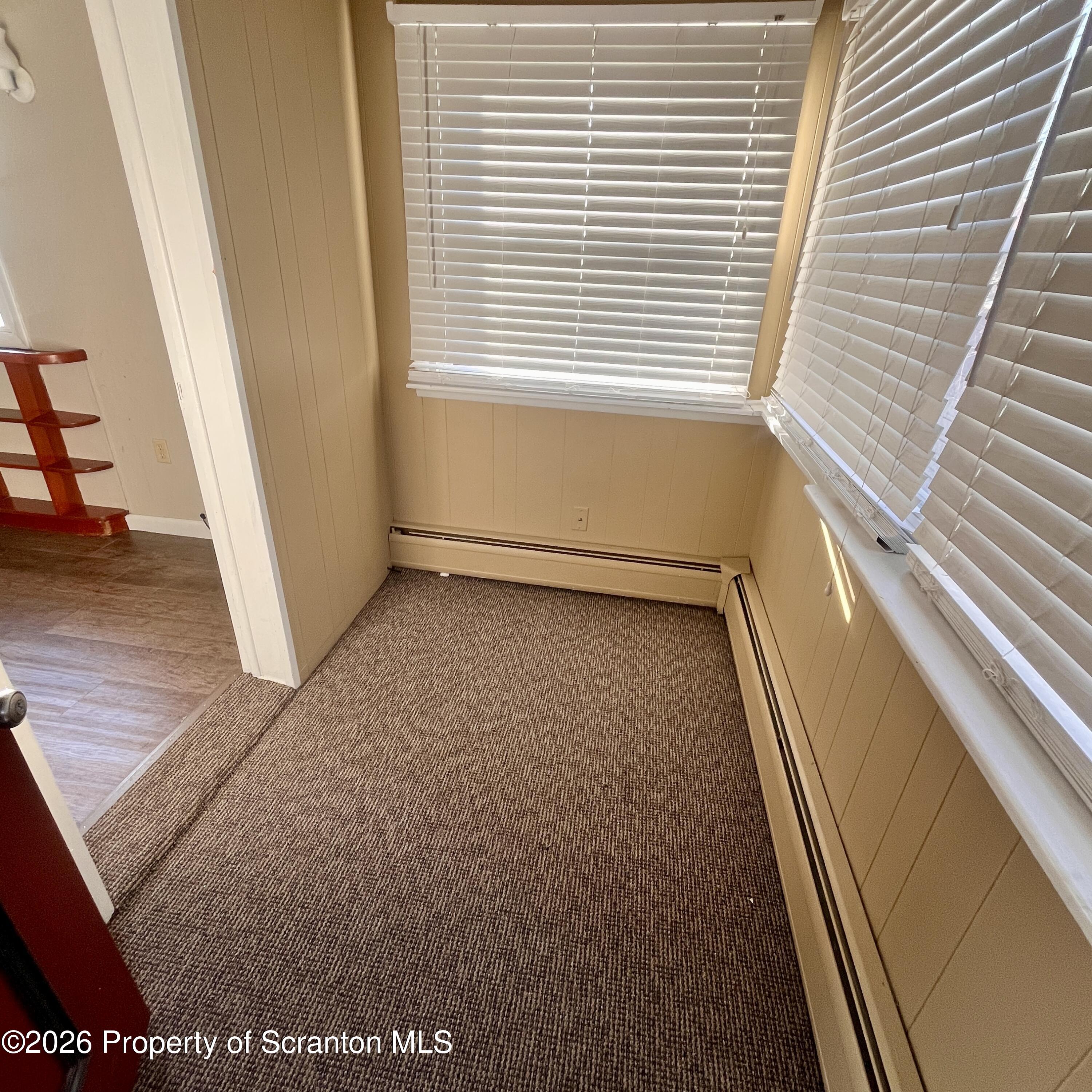 707 Prospect Avenue, Unit REAR Scranton, PA 18505 - Photo 3 of 11 a view of an empty room with a window