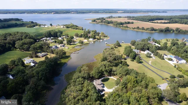 an aerial view of lake residential house with outdoor space