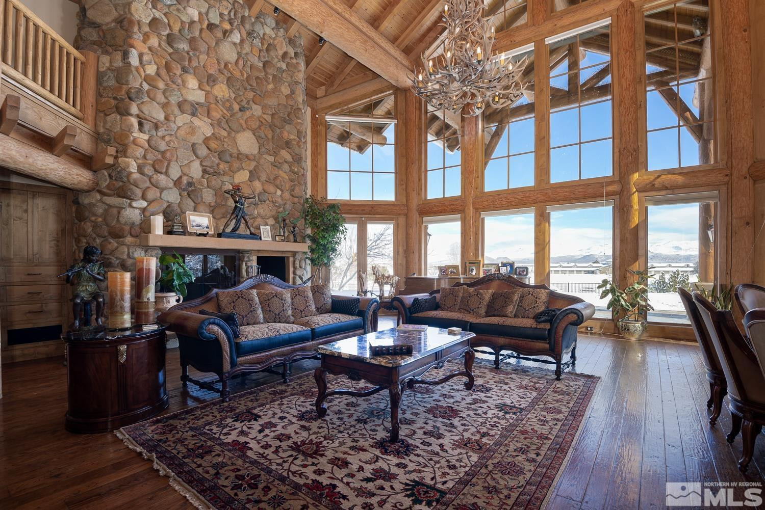 281 Fredricksburg Road Gardnerville, NV 89460 - Photo 12 of 38 a living room with furniture or couch and a large window