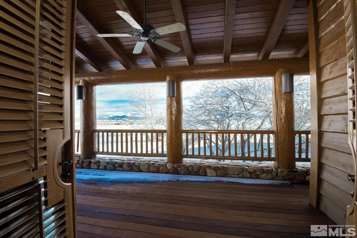 281 Fredricksburg Road Gardnerville, NV 89460 - Photo 16 of 38 a view of empty room with wooden floor and windows