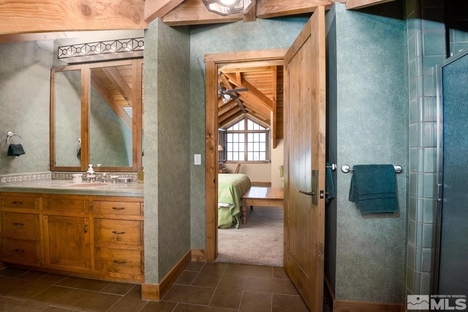 281 Fredricksburg Road Gardnerville, NV 89460 - Photo 24 of 38 a view of a bathroom from a hallway
